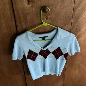 Blue polo sweater? Medium
